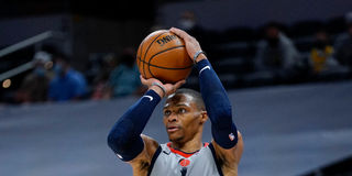 Russell Westbrook #4 of the Washington Wizards shoots a three-point basket 