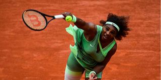 Serena Williams of the US serves the ball to Danielle Collins of the US during Roland Garros French Open