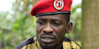 NUP leader Robert Kyagulanyi, popularly known as Bobi Wine, in a red beret.