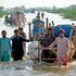 Stranded families in Pakistan after flooding.