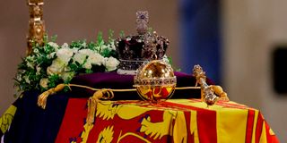 The coffin of Queen Elizabeth II, draped in a Royal Standard