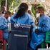 Health workers prepare for an Ebola vaccination drive in Mbandaka, DR Congo.