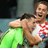 Croatia's Pasalic and Livakovic celebrate