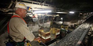 A shaft manager monitors production on January 19, 2011, in 14 Shaft of the Impala Platinum mine in Phokeng