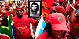 Supporters of the far-left Economic Freedom Fighter (EFF) party march in Johannesburg on February 28, 2020