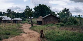 A girl walks around Kishishe in eastern