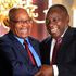 South Africa's President Cyril Ramaphosa shakes hands with his predecessor Jacob Zuma 