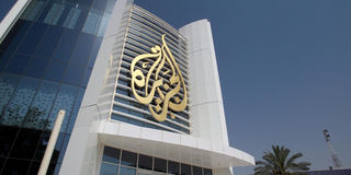 The Al Jazeera Media Network logo is seen on its headquarters building in Doha, Qatar June 8, 2017.