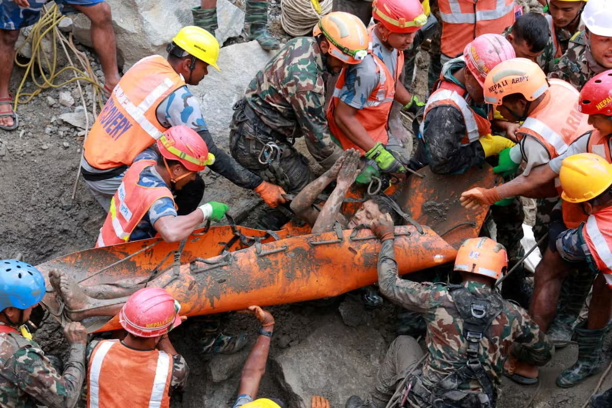 Two men survived nine days trapped in a Nepal flood tunnel